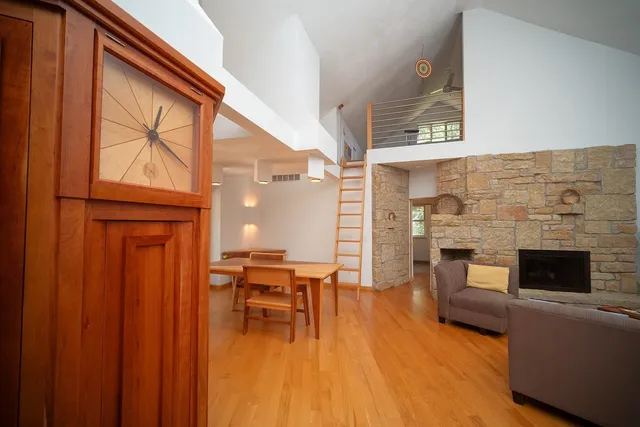 a kitchen with stainless steel appliances granite countertop a stove a sink dishwasher and a microwave