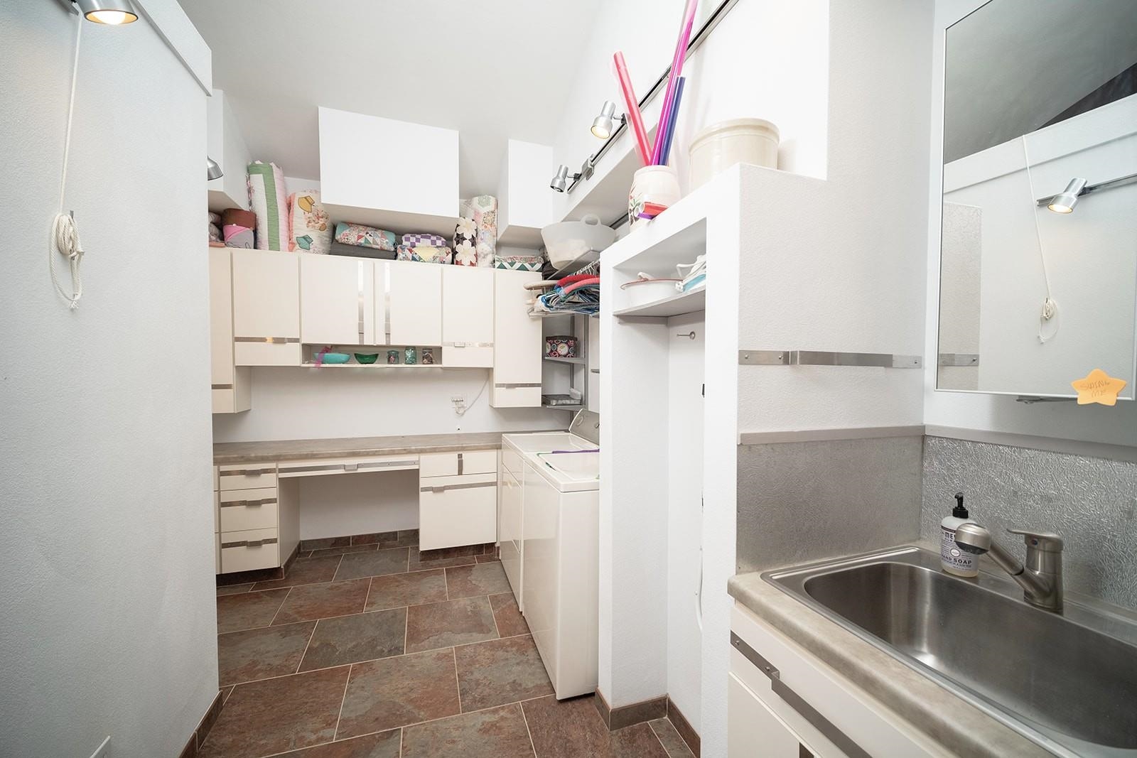 7822 Burr Oak Road Roscoe, IL 61073 - Photo 41 of 53 a kitchen with a sink and cabinets