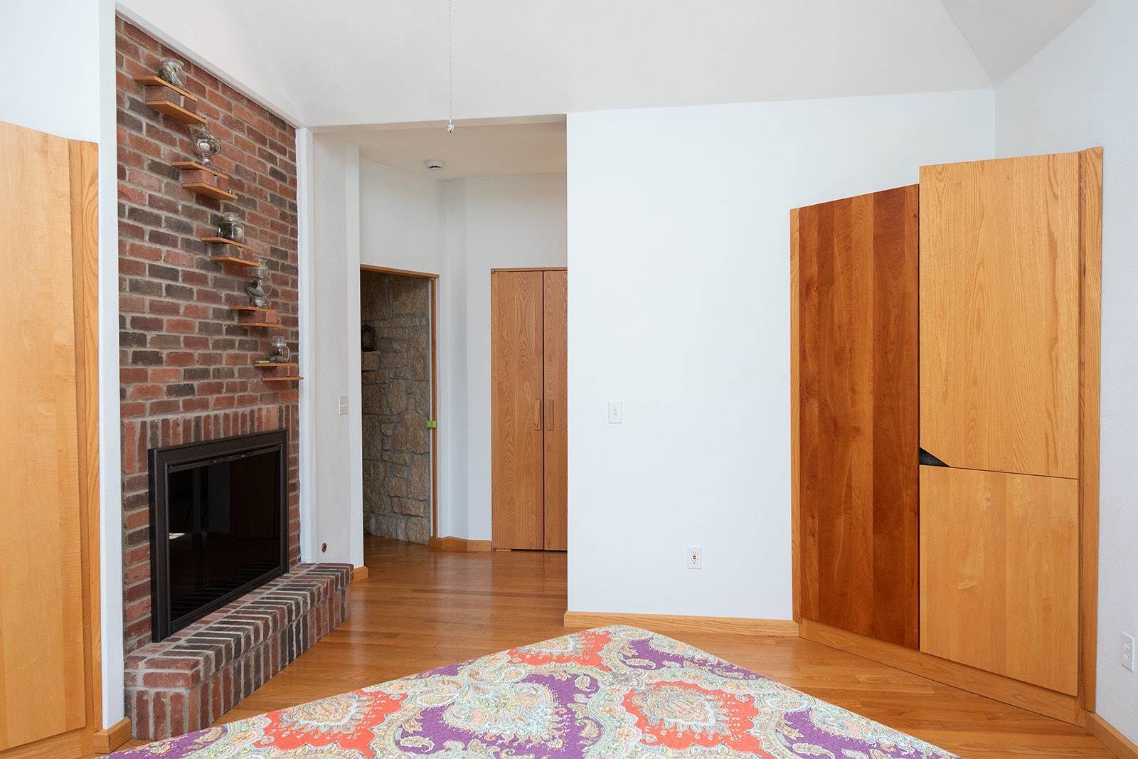 7822 Burr Oak Road Roscoe, IL 61073 - Photo 50 of 53 a bedroom with a bed and a fireplace