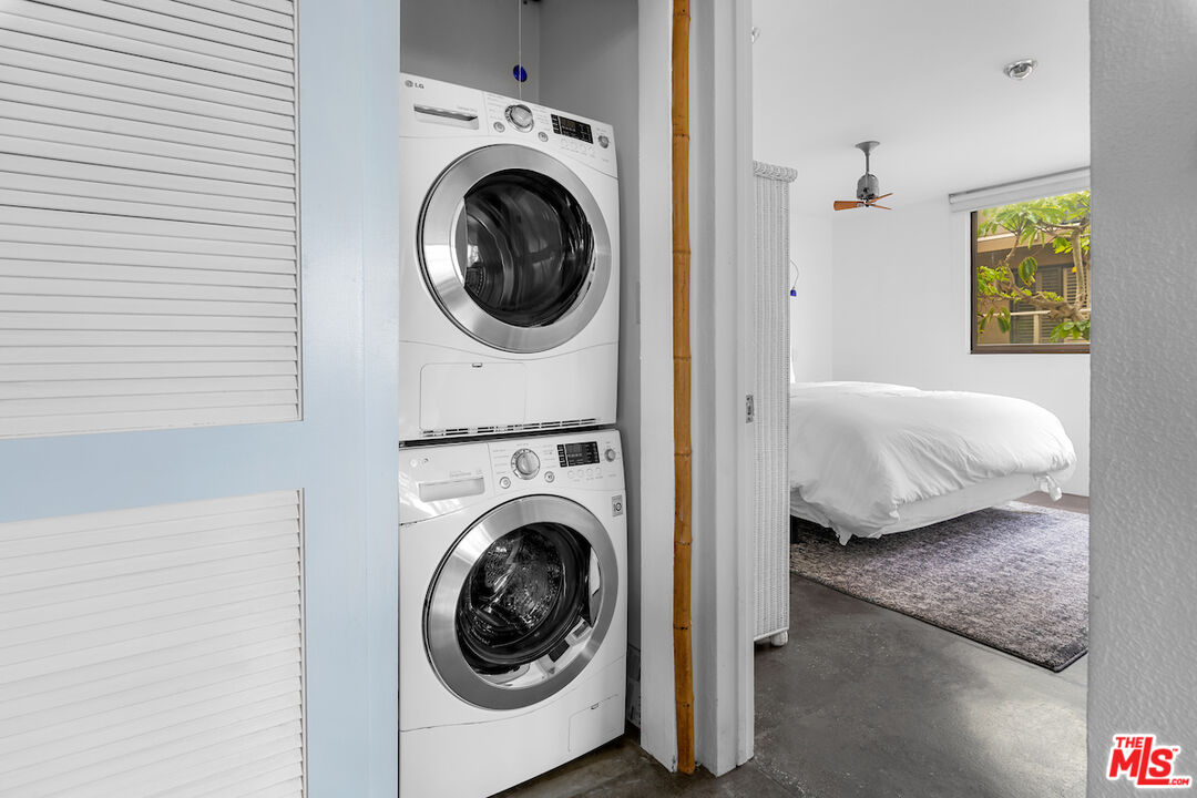 6209 Pacific Avenue, Unit 104 Playa del Rey, CA 90293 - Photo 17 of 18 a view of a bedroom with washer and dryer