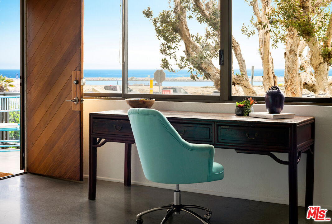 6209 Pacific Avenue, Unit 104 Playa del Rey, CA 90293 - Photo 6 of 18 a view of a chair and table in the balcony
