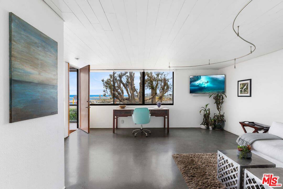 6209 Pacific Avenue, Unit 104 Playa del Rey, CA 90293 - Photo 10 of 18 a living room with furniture and wooden floor