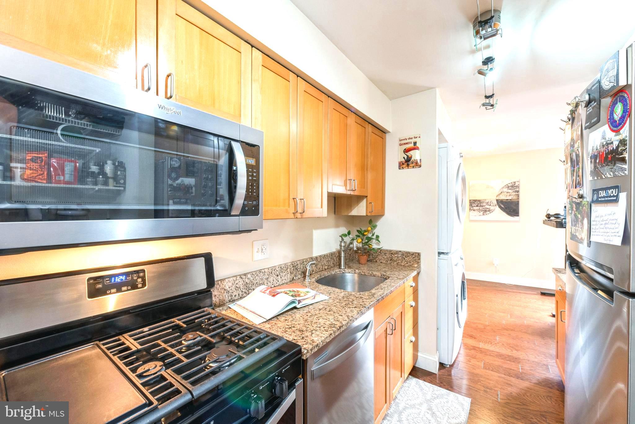 11232 Chestnut Grove Square, Unit 334 Reston, VA 20190 - Photo 10 of 31 Galley Kitchen features stainless steel appliances