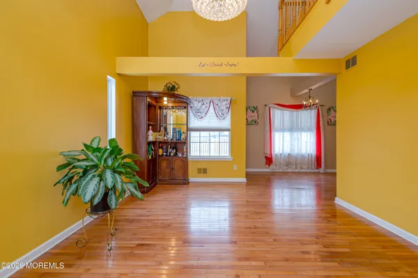 a view of a door and chair in the room