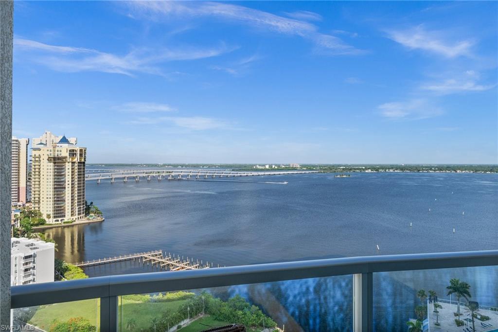 a view of a lake from a balcony