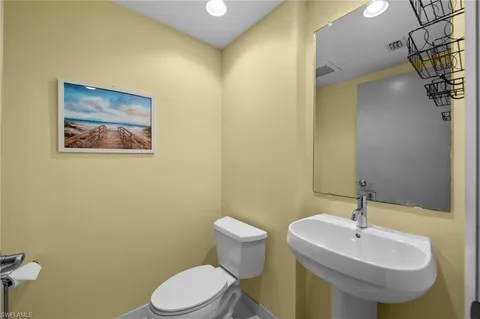 a bathroom with a sink and a toilet