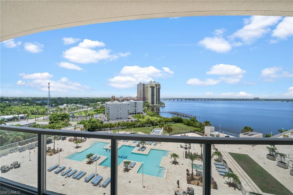3000 Oasis Grand Boulevard, Unit 906 Fort Myers, FL 33916 - Photo 19 of 21 a view of a balcony with an outdoor space