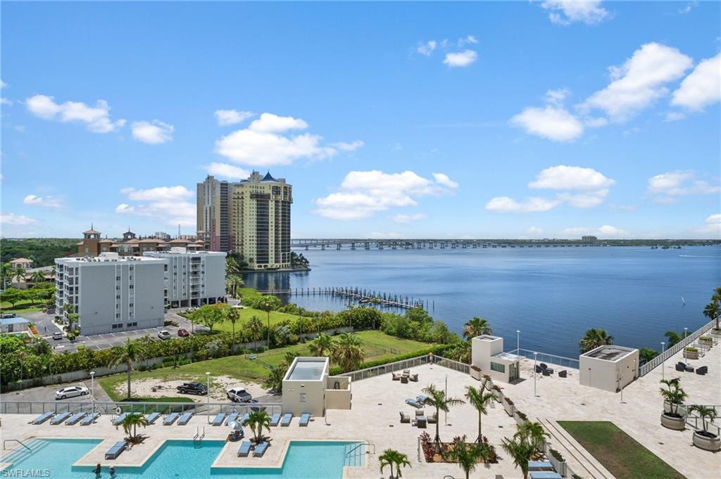 3000 Oasis Grand Boulevard, Unit 906 Fort Myers, FL 33916 - Photo 20 of 21 a view of a terrace with a garden and couches