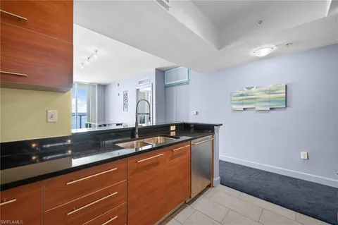 a view of a double vanity sink and a mirror