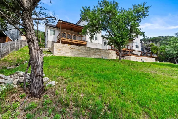 a backyard of a house with seating space