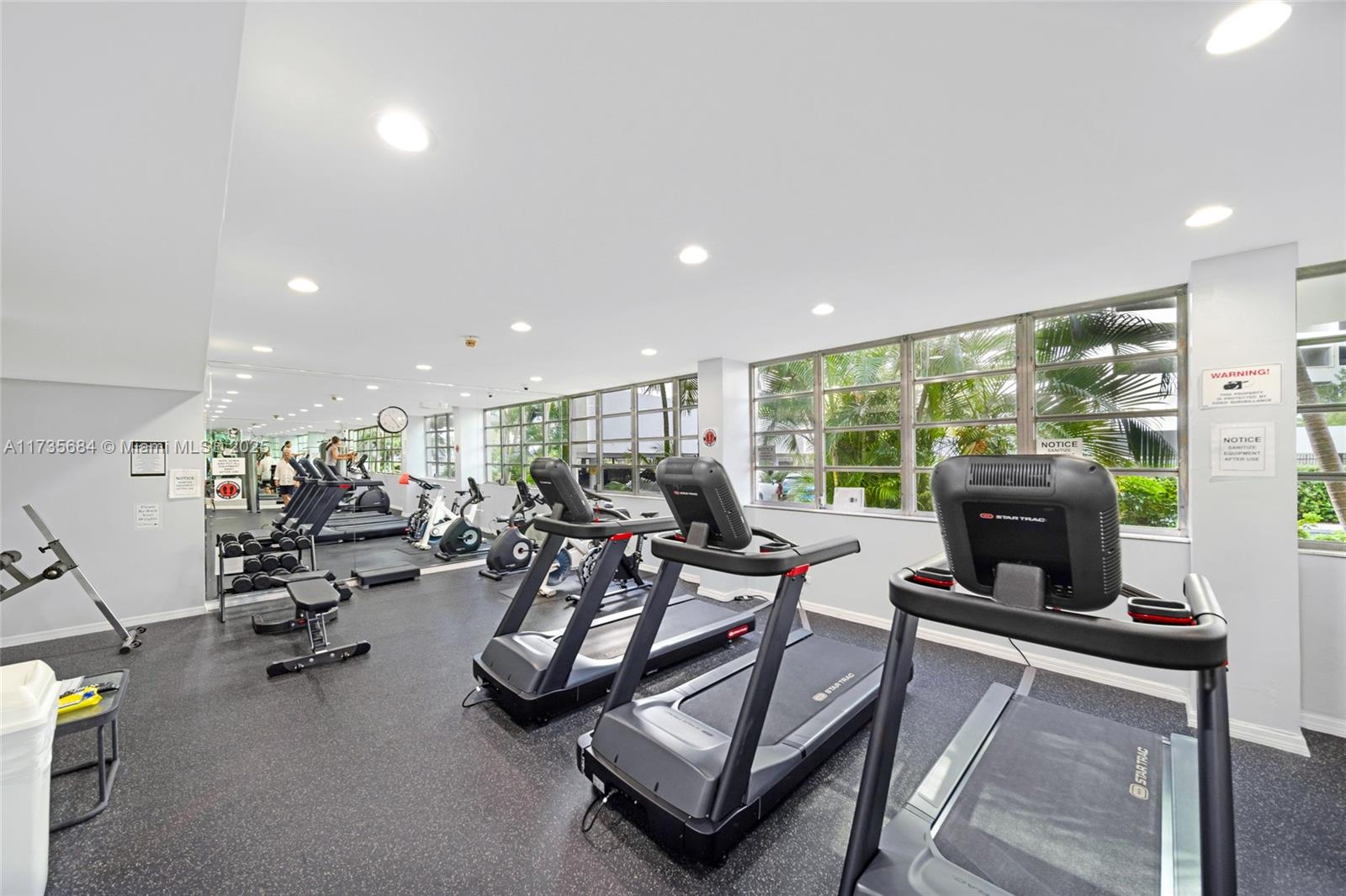 1408 Brickell Bay Drive, Unit 917 Miami, FL 33131 - Photo 18 of 18 a view of a room with gym equipment