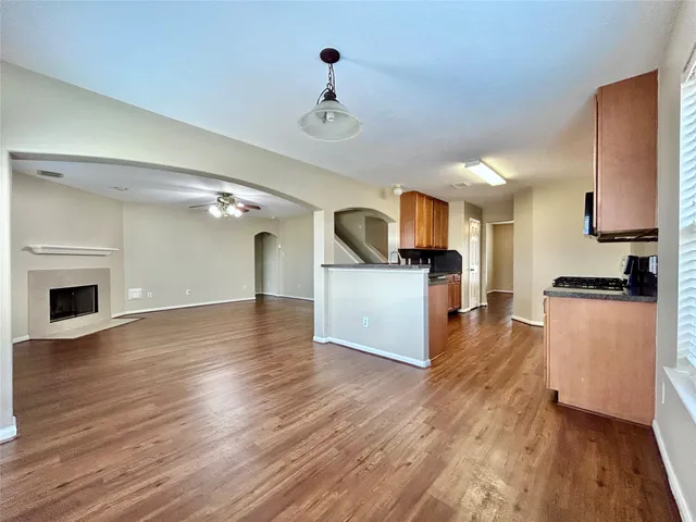 a view of a kitchen with a sink cabinet a kitchen and a window