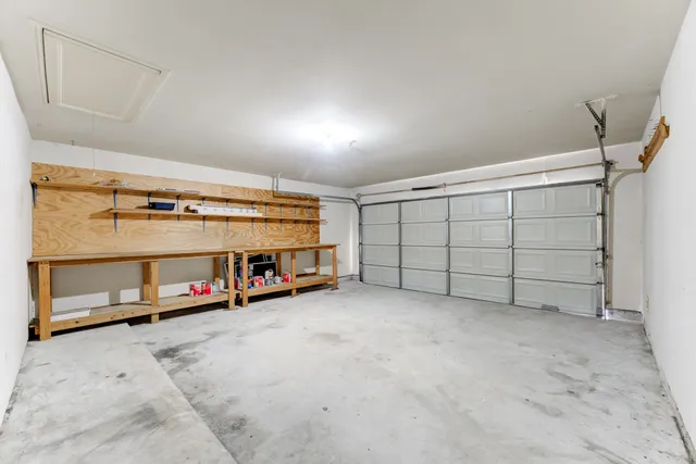 a view of a garage with storage