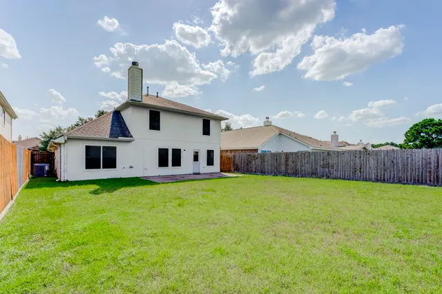 a house view with a garden space