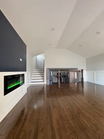 a view of a livingroom with wooden floor