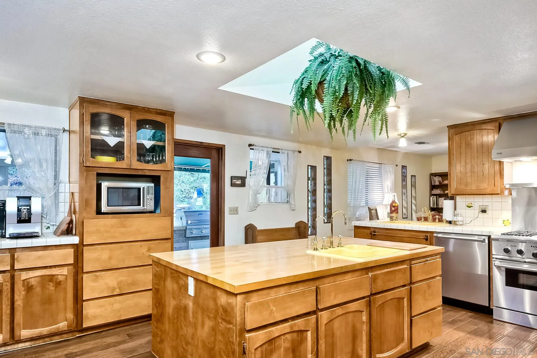 1828 Pine View Road Alpine, CA 91901 - Photo 20 of 53 a kitchen with a sink and cabinets