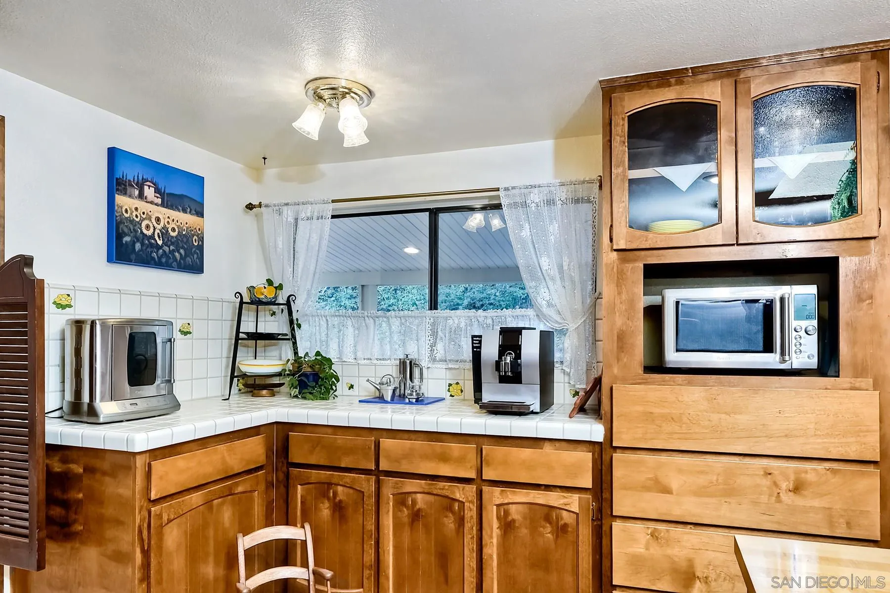 1828 Pine View Road Alpine, CA 91901 - Photo 21 of 53 a kitchen with a sink and cabinets