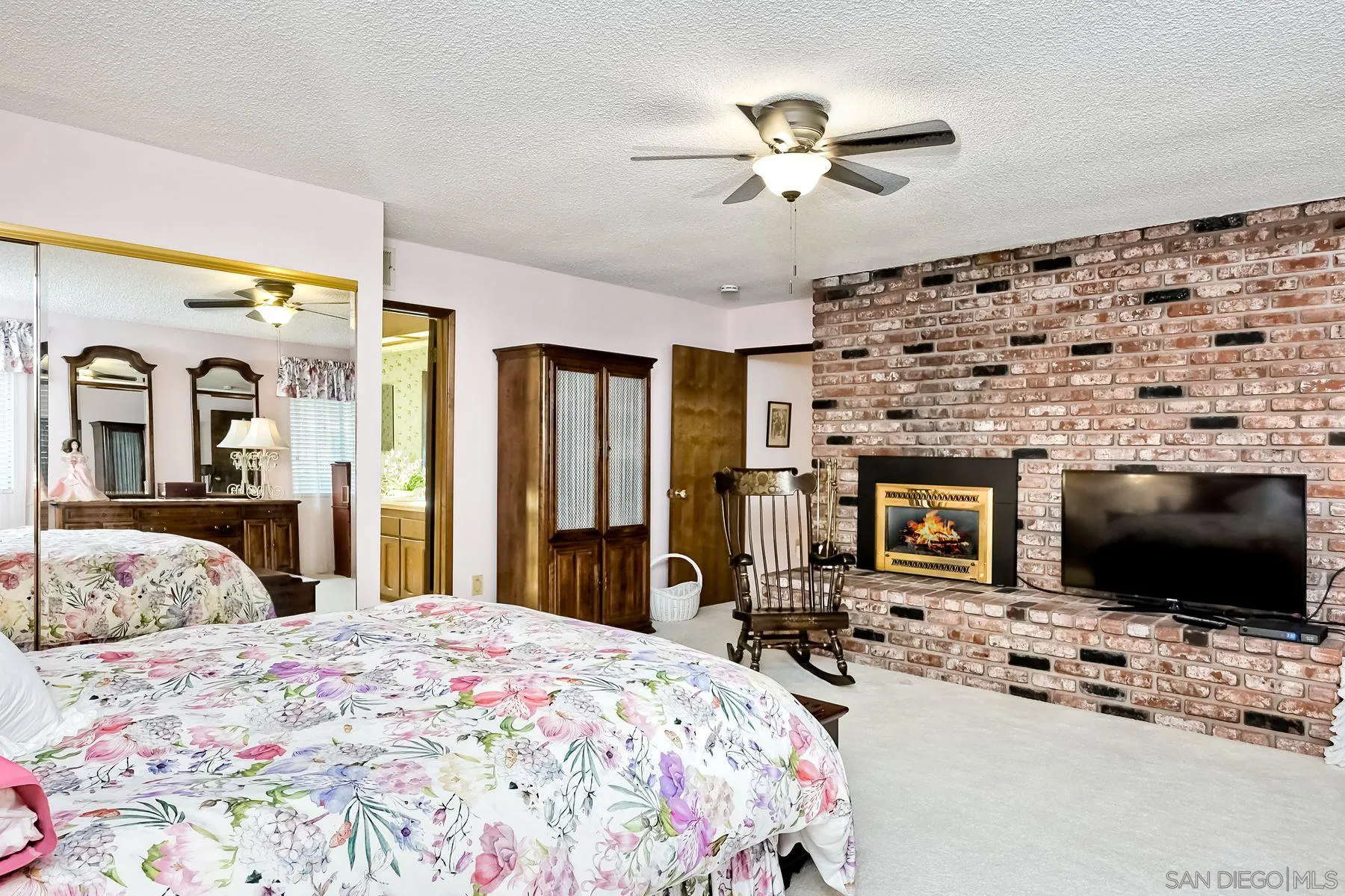 1828 Pine View Road Alpine, CA 91901 - Photo 32 of 53 a bed room with a bed and a television
