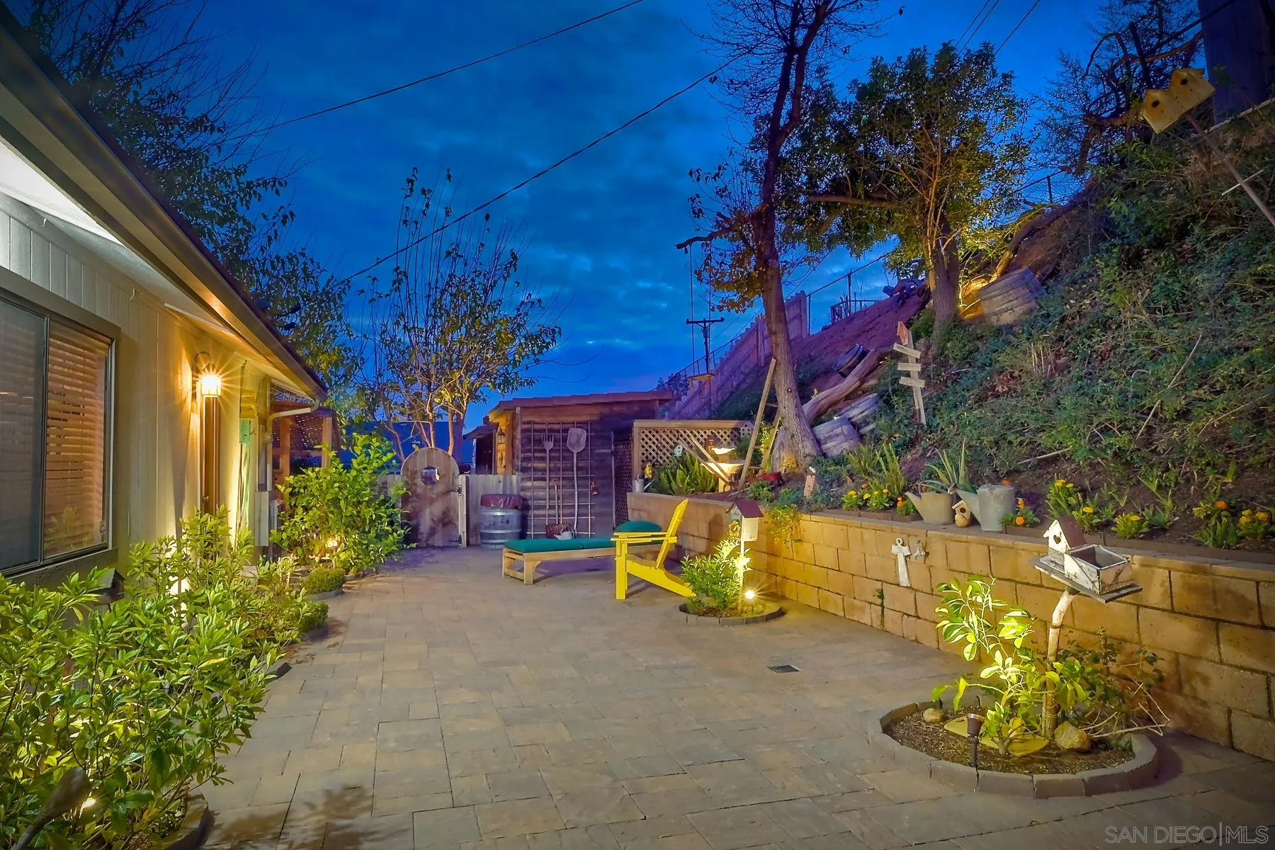 1828 Pine View Road Alpine, CA 91901 - Photo 44 of 53 a view of a patio with table and chairs potted plants and large tree