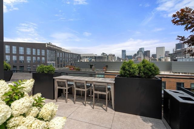 a view of a balcony with chairs
