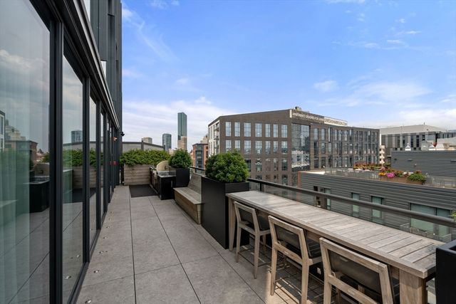 a view of roof deck with patio