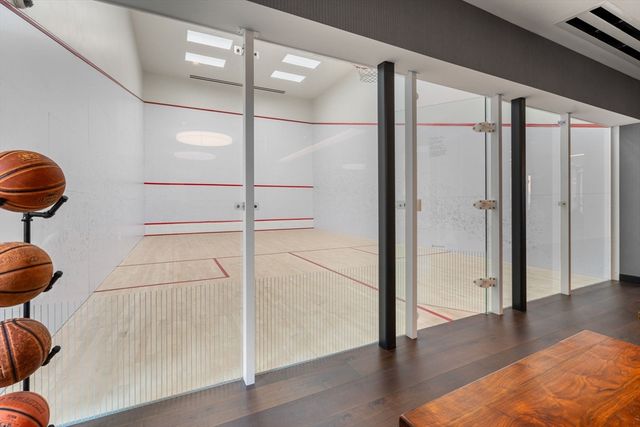 a living room with fireplace furniture and a window