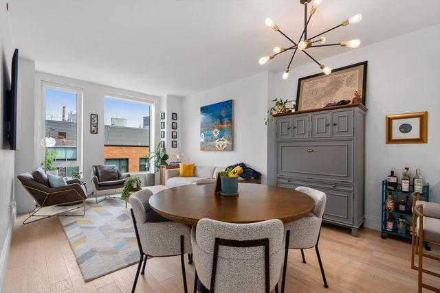 a view of a dining room with furniture