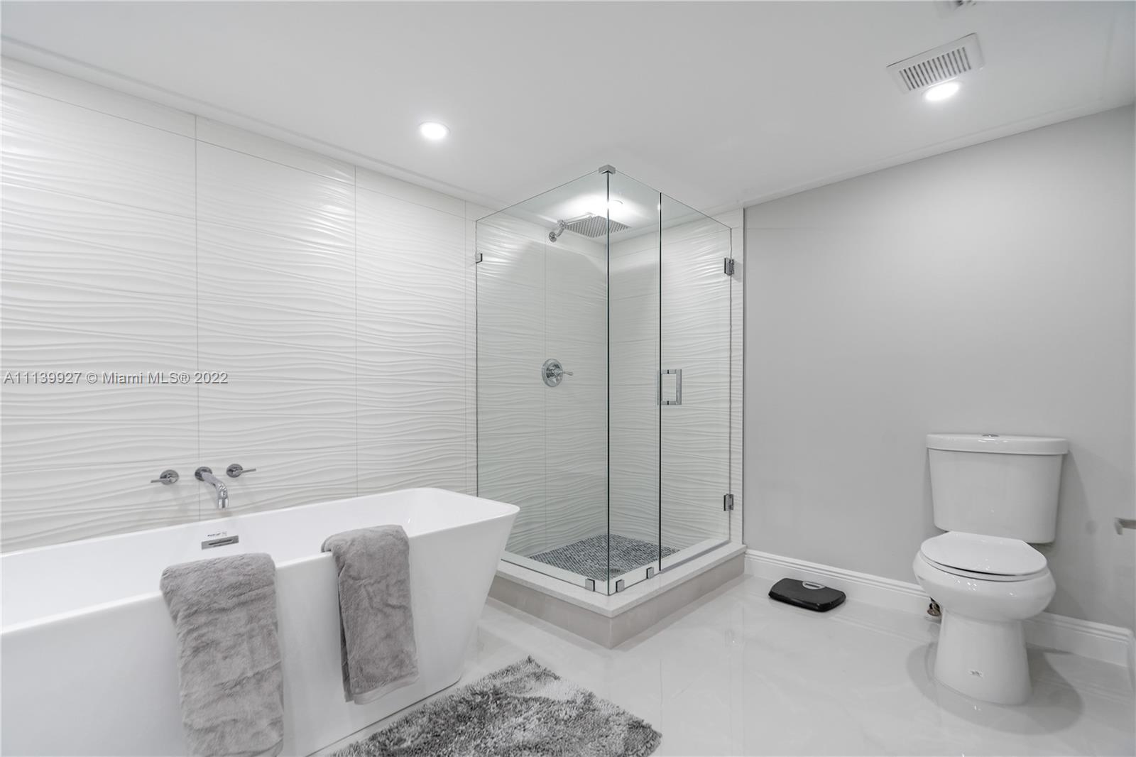 Boca Pointe Boca Raton, FL 33433 - Photo 13 of 41 a bathroom with a shower and a toilet