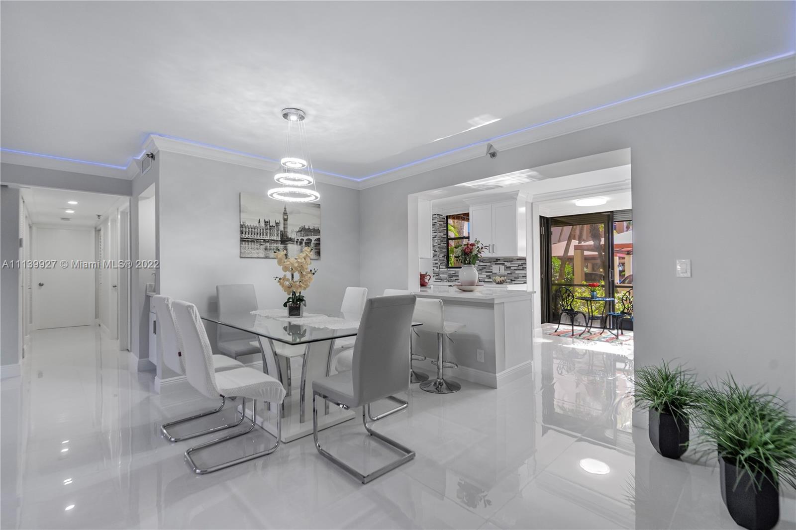 Boca Pointe Boca Raton, FL 33433 - Photo 4 of 41 a view of a dining room with furniture and chandelier