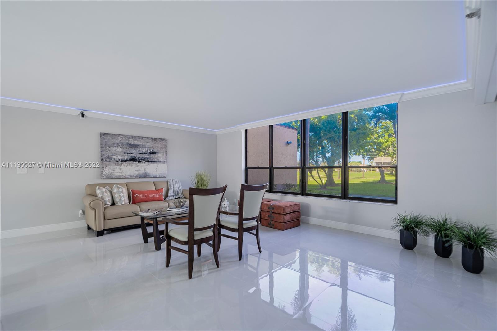 Boca Pointe Boca Raton, FL 33433 - Photo 9 of 41 a living room with furniture and a potted plant