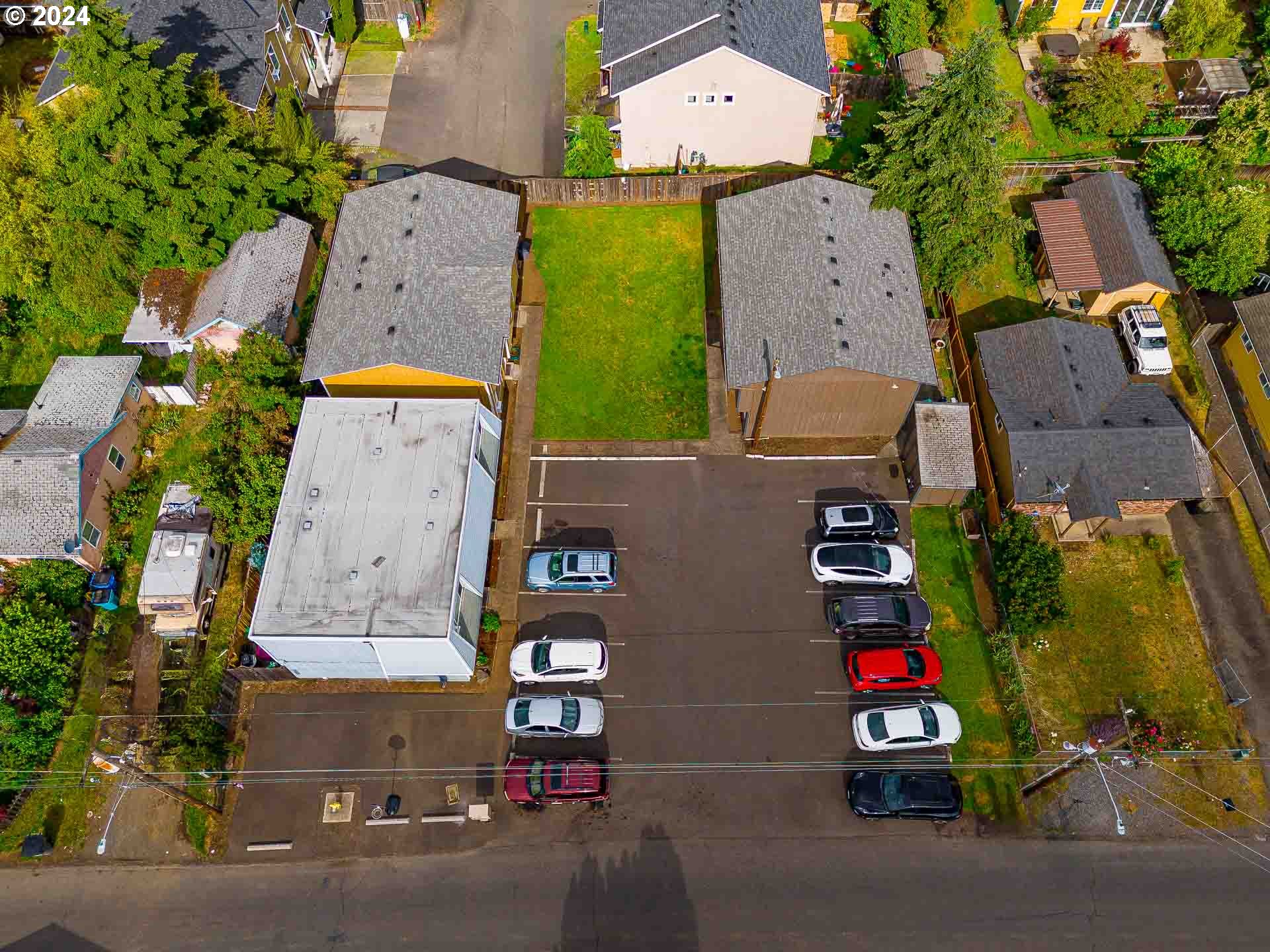 2015 Carlson Road Vancouver, WA 98661 - Photo 1 of 14 an aerial view of a house with a parking space