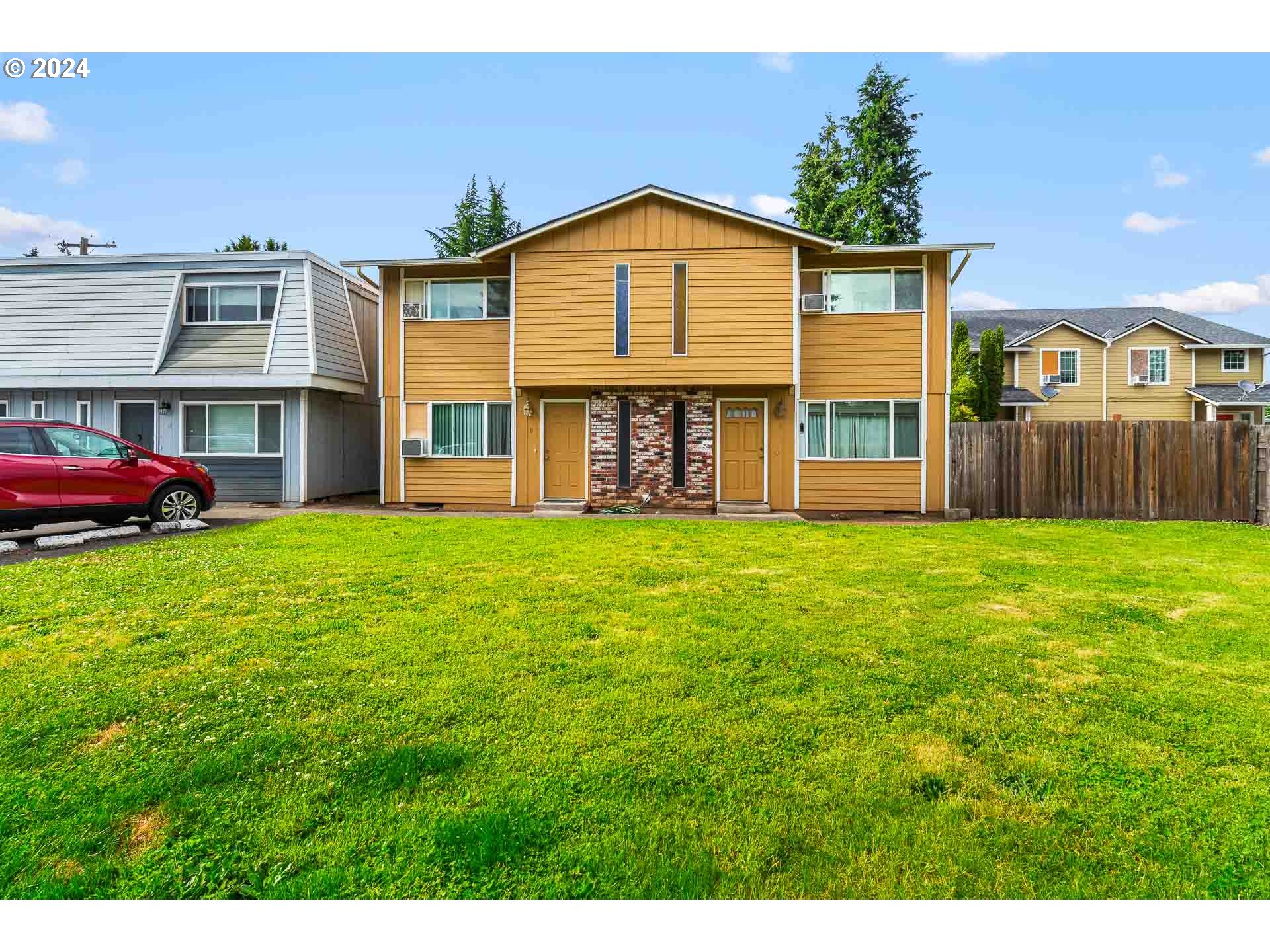 2015 Carlson Road Vancouver, WA 98661 - Photo 4 of 14 a front view of a house with garden