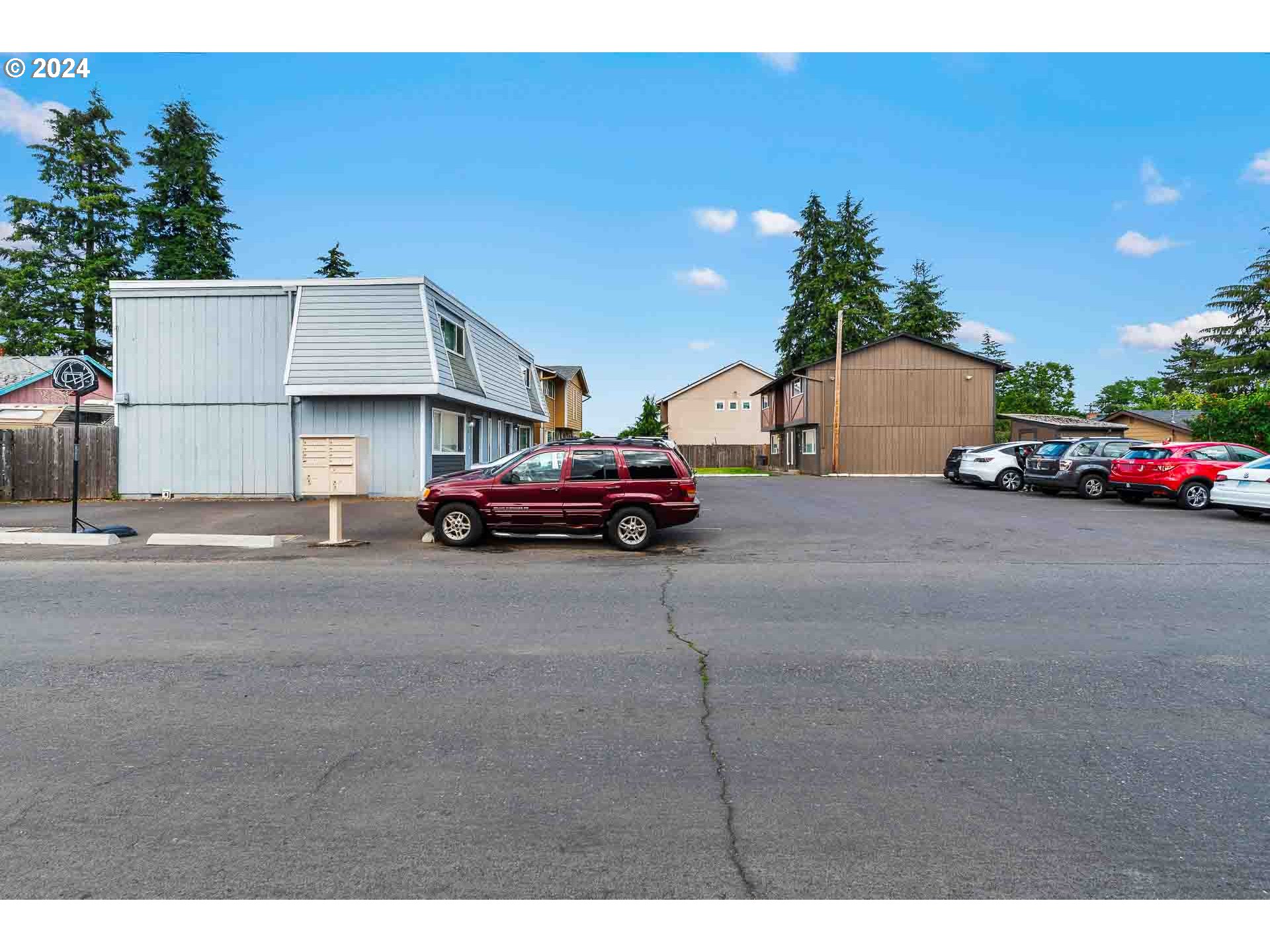 2015 Carlson Road Vancouver, WA 98661 - Photo 6 of 14 a car parked in front of a house