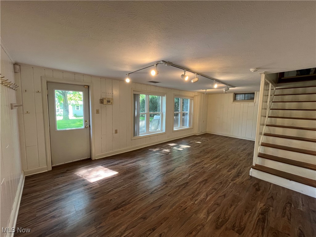 3252 Stanley Road Akron, OH 44333 - Photo 17 of 22 Recreation room with walk out to patio and expansive backyard, stairs lead to Kitchen main level