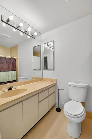 a view of a swimming pool with a lounge chair