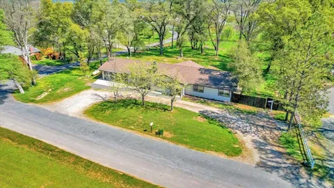 a view of a garden with an empty space