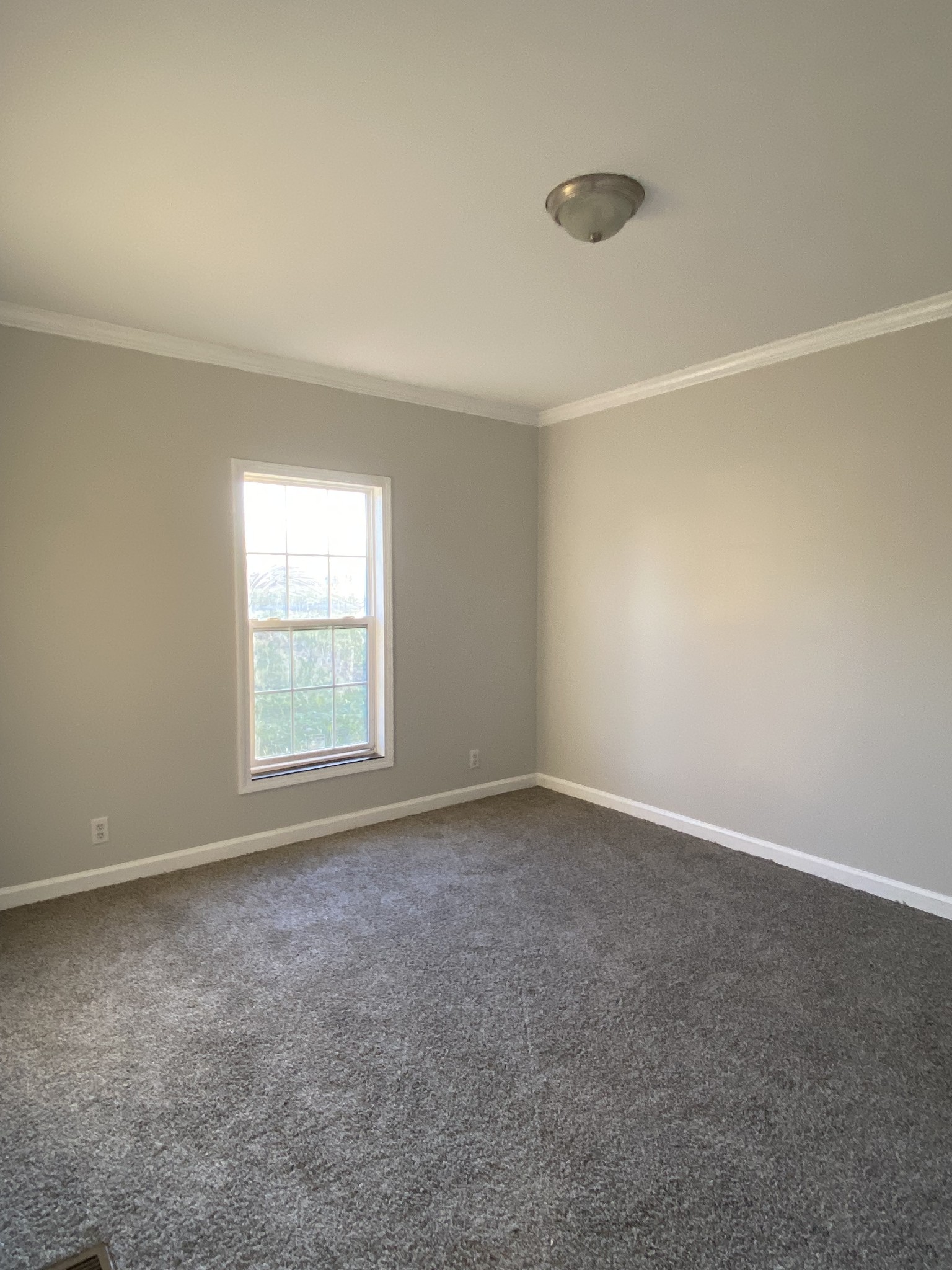 239 Dotson Road Lafayette, TN 37083 - Photo 8 of 12 an empty room with a window