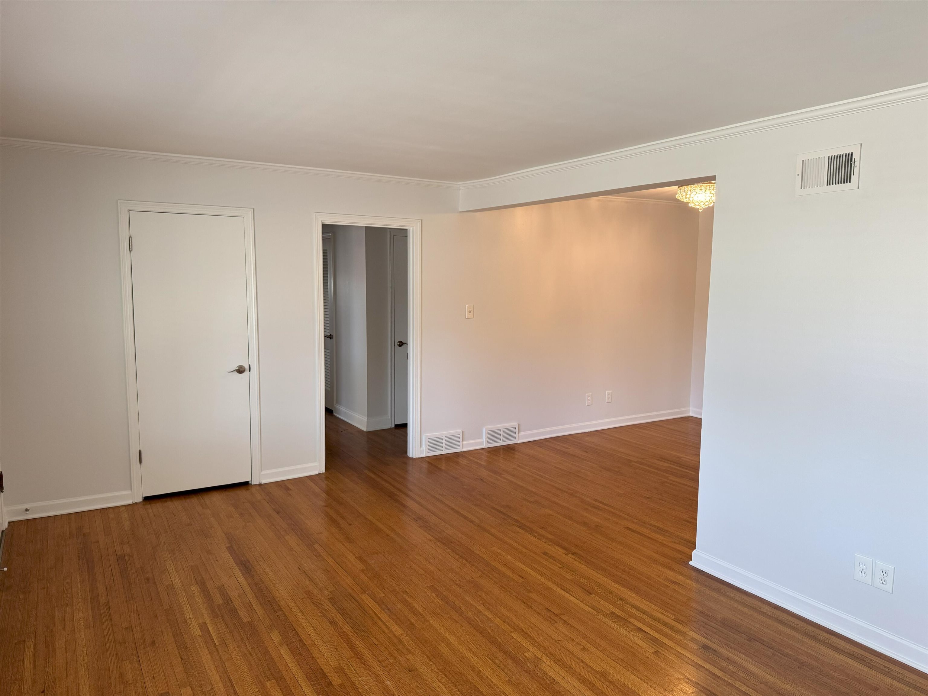 4803 Hummingbird Lane Memphis, TN 38117 - Photo 10 of 36 a view of an empty room with wooden floor and closet