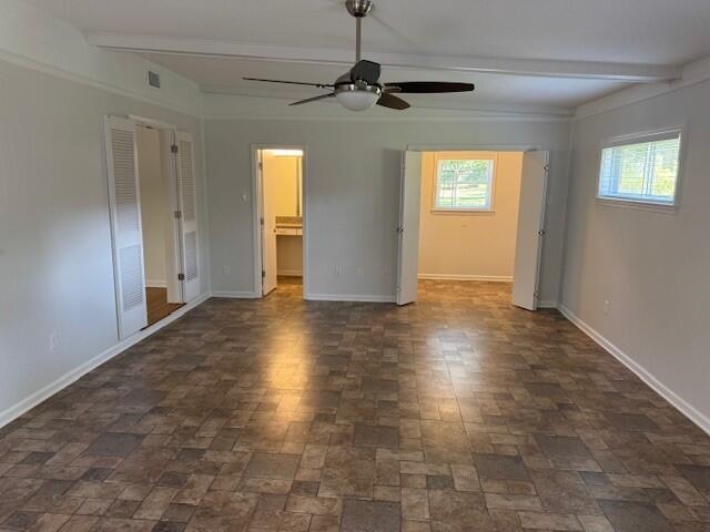 4803 Hummingbird Lane Memphis, TN 38117 - Photo 15 of 36 a view of an empty room with window and wooden floor