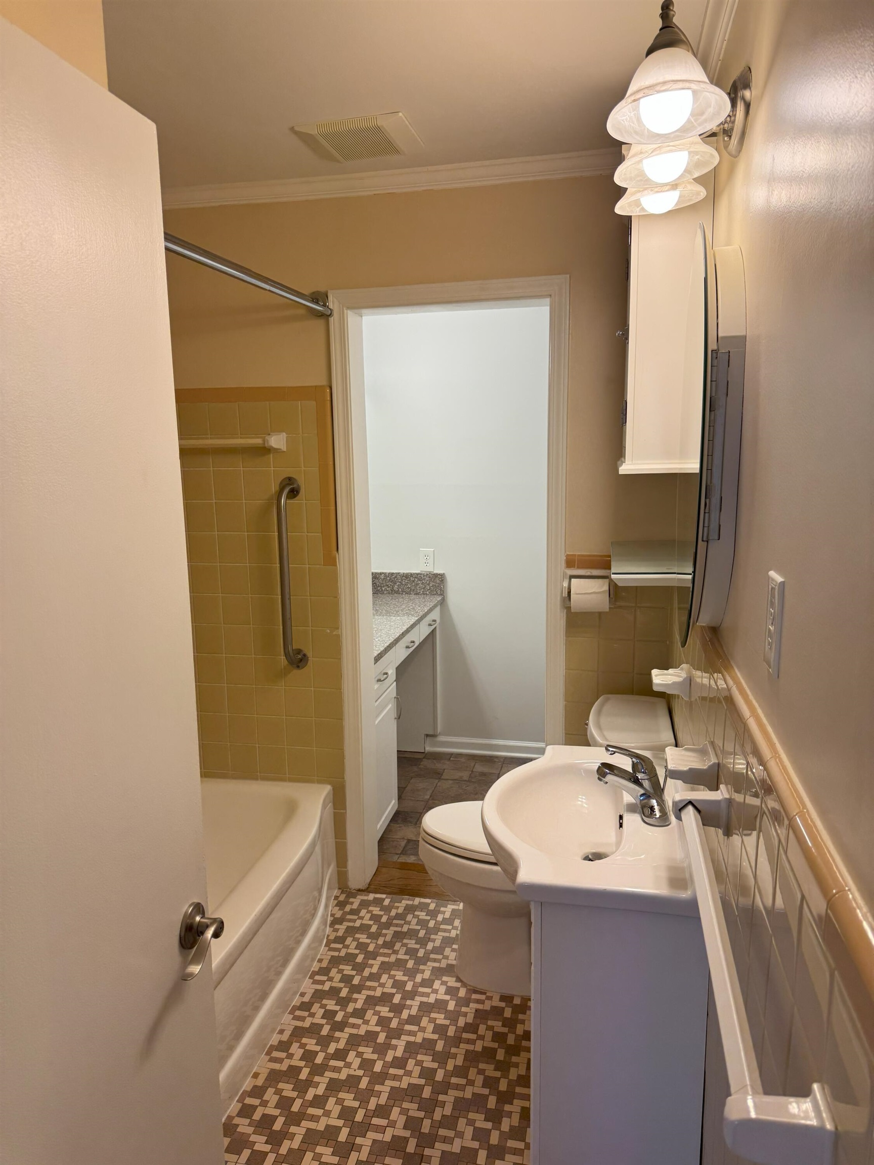 4803 Hummingbird Lane Memphis, TN 38117 - Photo 17 of 36 a bathroom with a sink toilet and shower