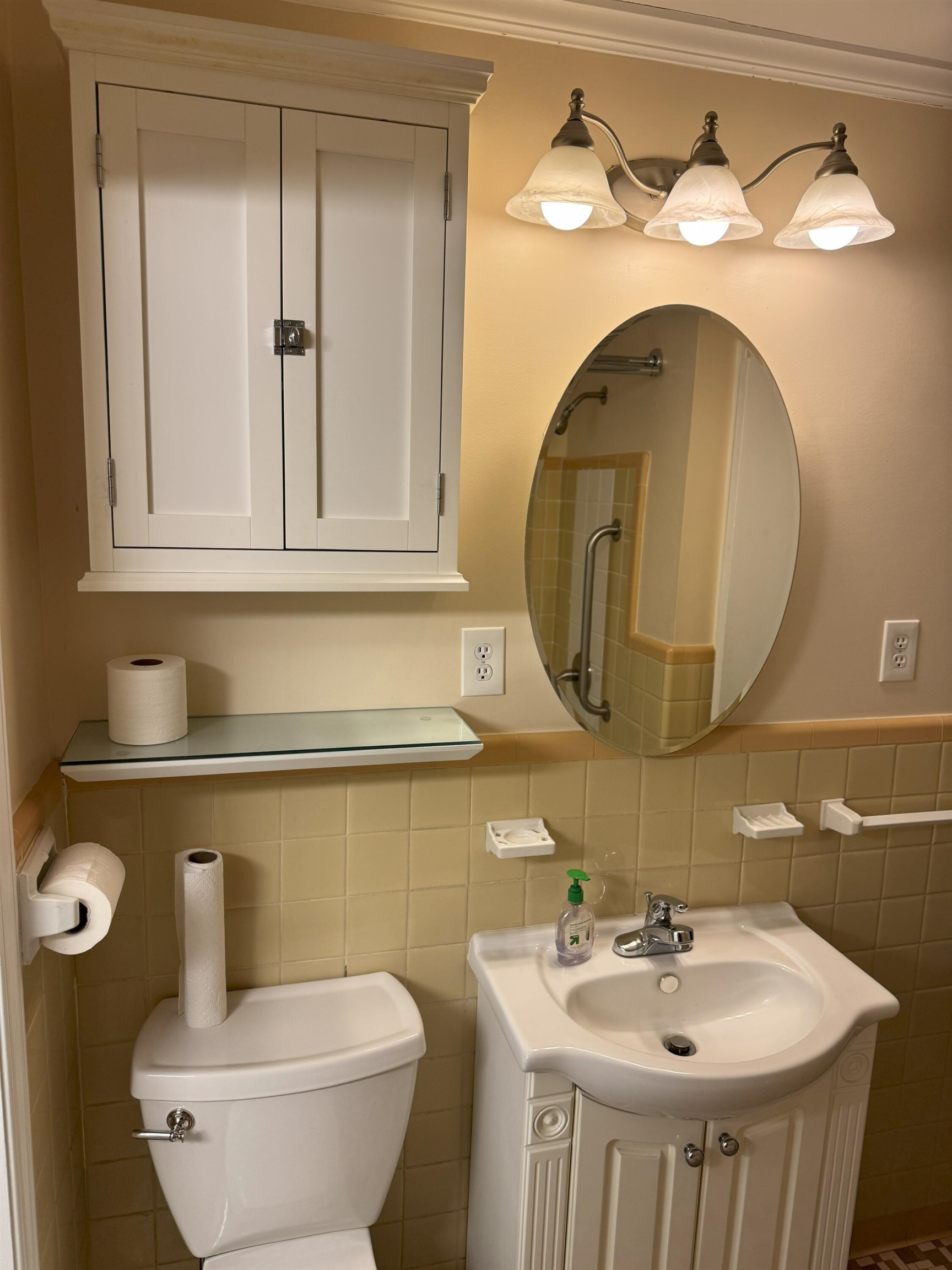 4803 Hummingbird Lane Memphis, TN 38117 - Photo 19 of 36 a bathroom with a toilet sink and mirror