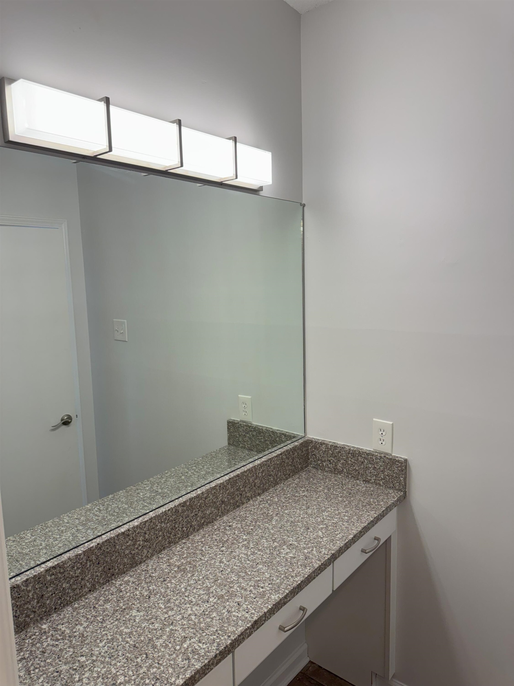 4803 Hummingbird Lane Memphis, TN 38117 - Photo 23 of 36 a bathroom with a granite countertop sink and vanity