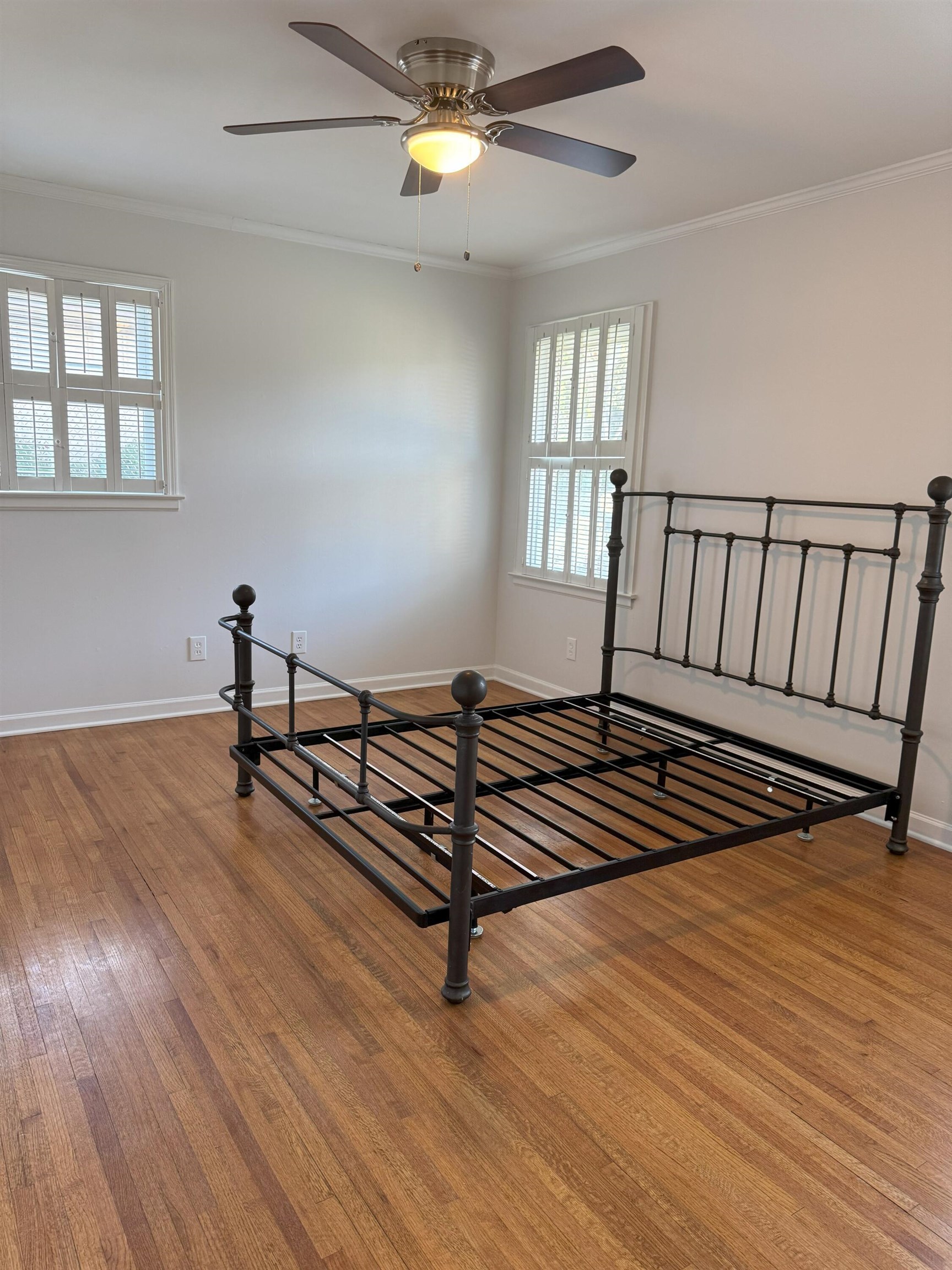 4803 Hummingbird Lane Memphis, TN 38117 - Photo 24 of 36 an empty room with windows and ceiling fan
