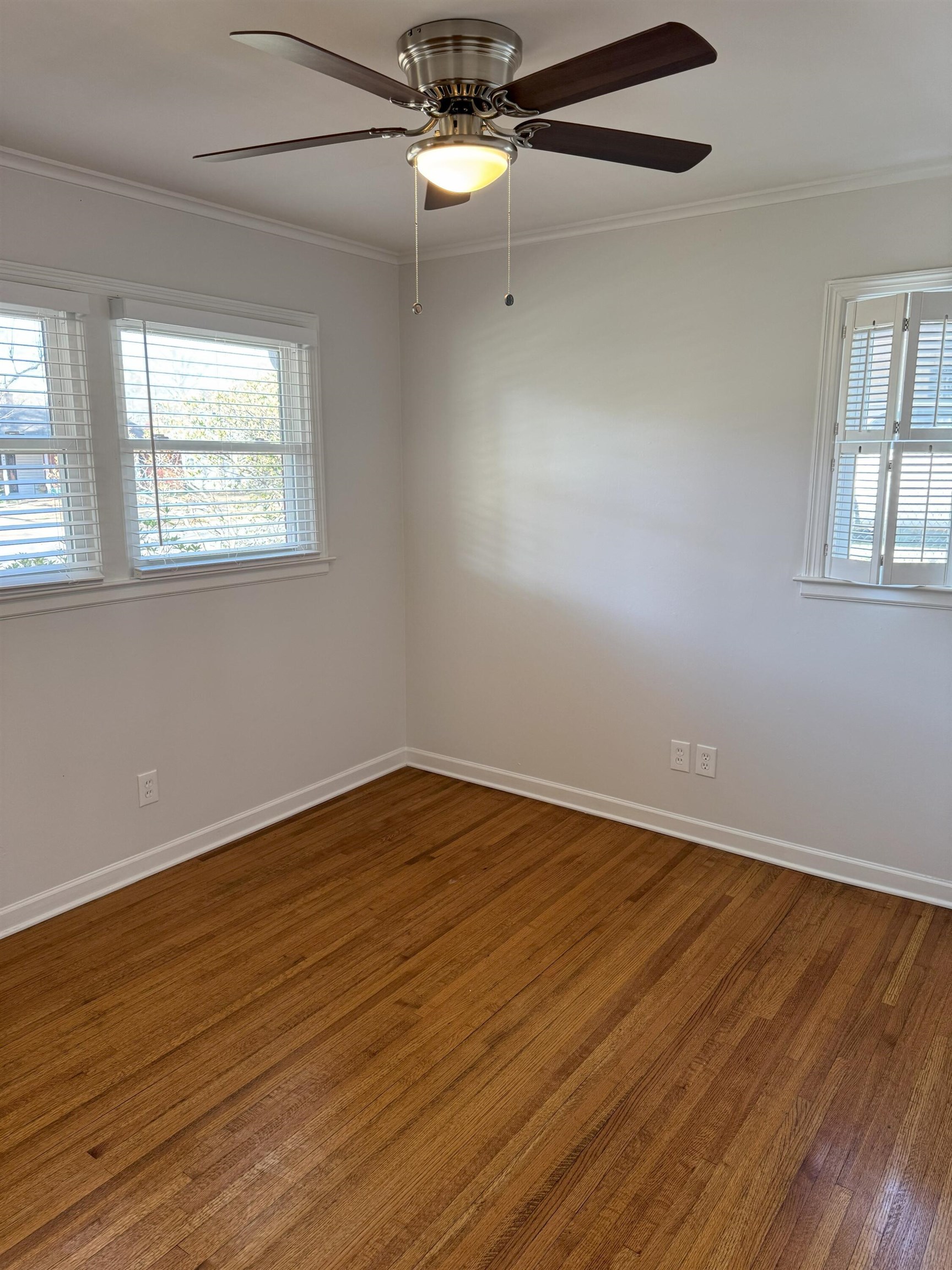 4803 Hummingbird Lane Memphis, TN 38117 - Photo 28 of 36 wooden floor in an empty room with a window