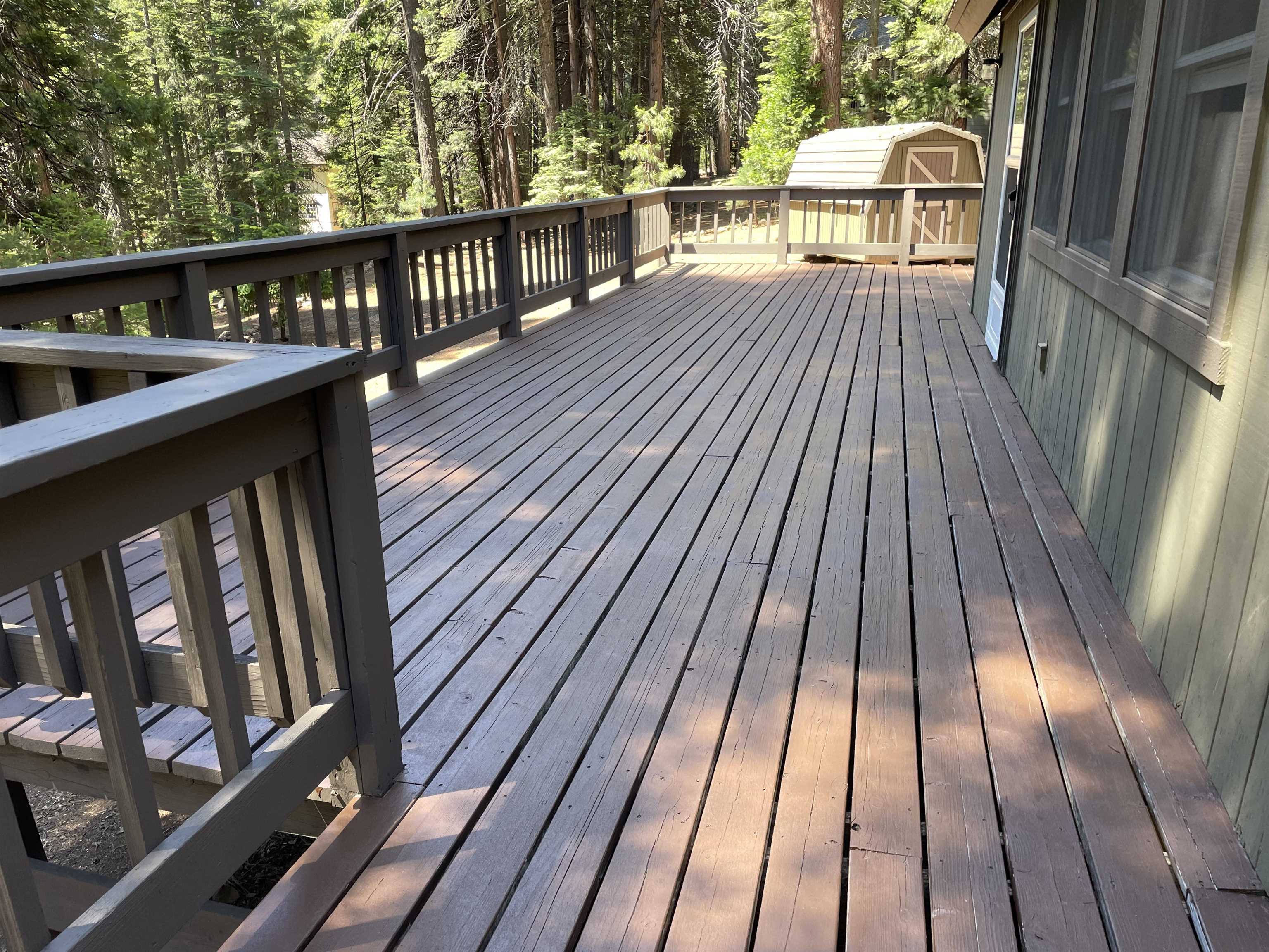 603 East Burnt Cedar Road Lake Almanor, CA 96137 - Photo 25 of 33 a balcony with wooden floor and furniture