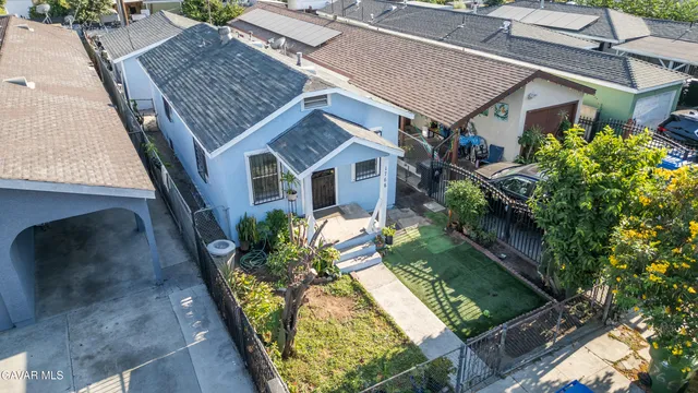 an aerial view of a house with balcony