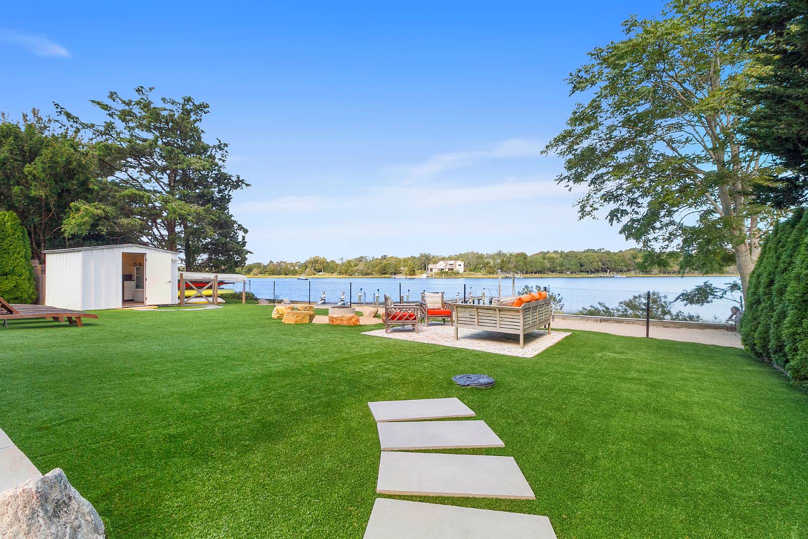 43 Harbor Drive Sag Harbor, NY 11963 - Photo 11 of 29 a view of a garden and lake