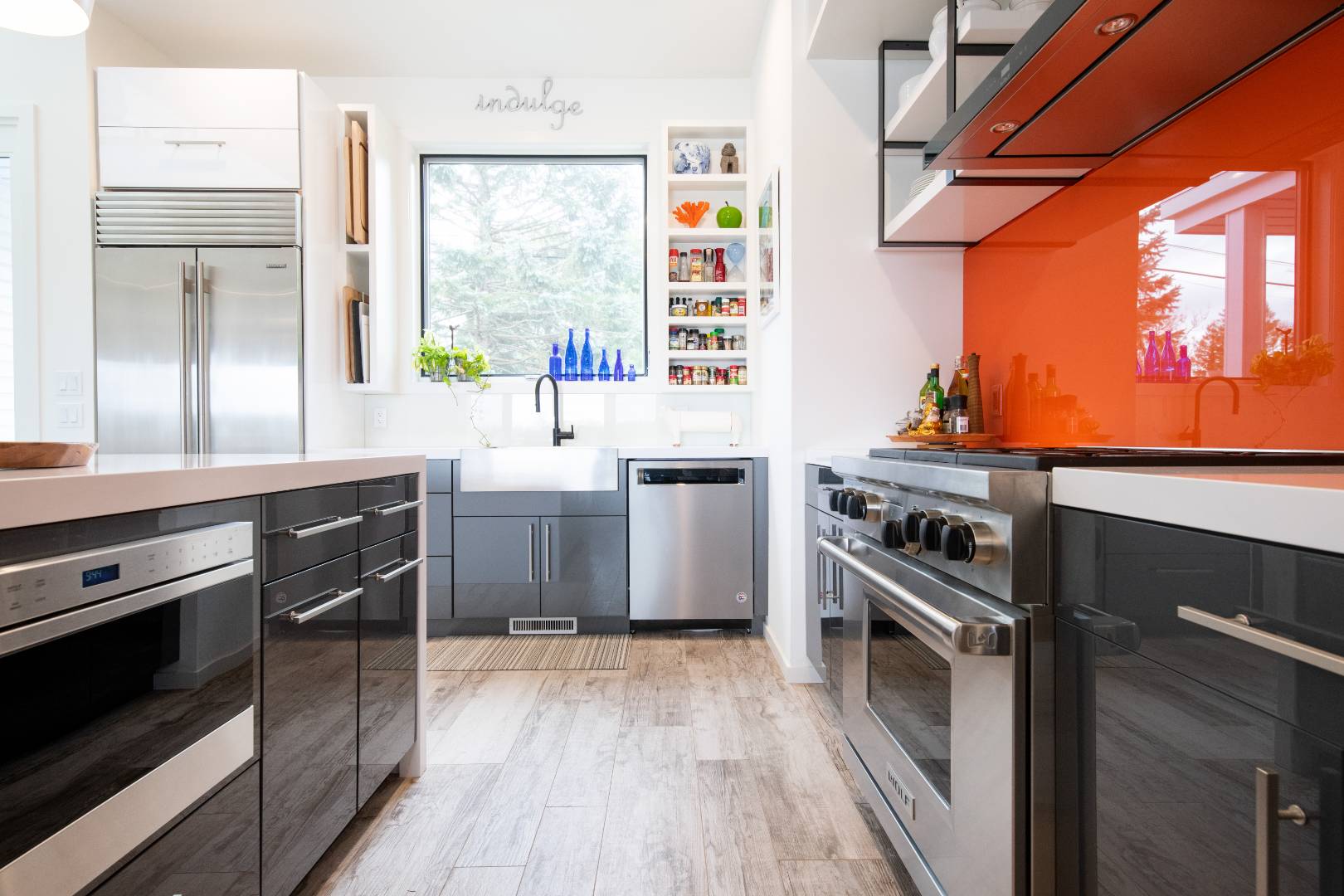 43 Harbor Drive Sag Harbor, NY 11963 - Photo 16 of 29 a kitchen with stainless steel appliances a stove a sink and a refrigerator