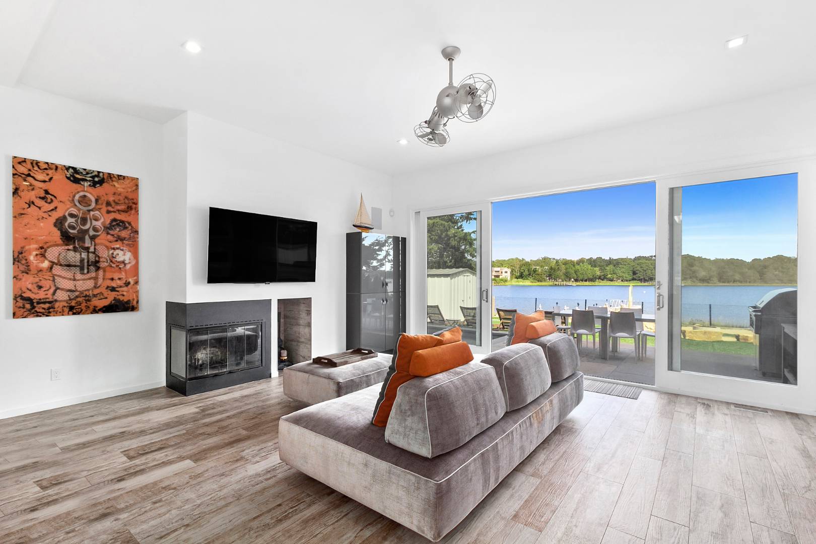 43 Harbor Drive Sag Harbor, NY 11963 - Photo 18 of 29 a living room with furniture fireplace and flat screen tv