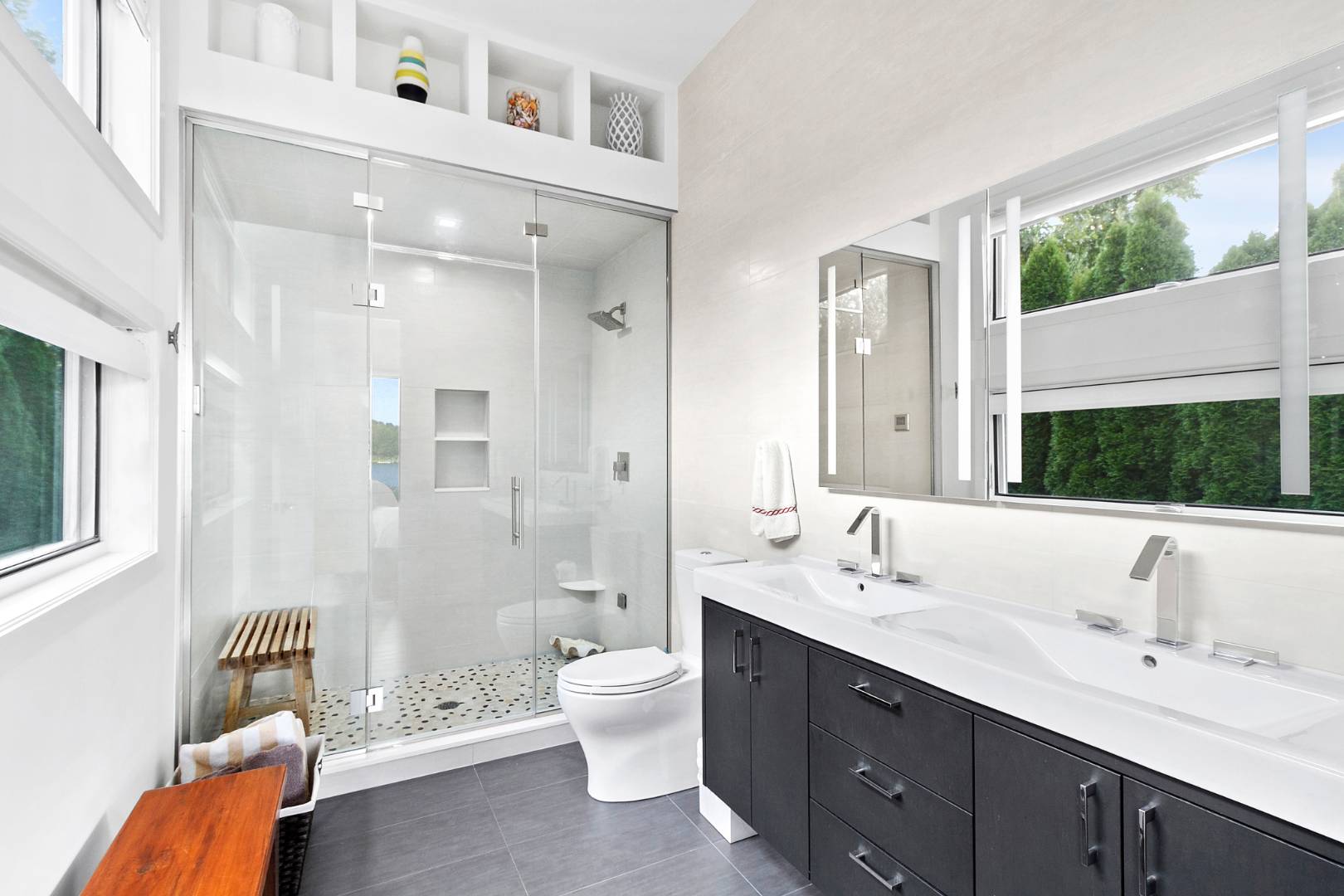 43 Harbor Drive Sag Harbor, NY 11963 - Photo 21 of 29 a spacious bathroom with a double vanity sink mirror and toilet
